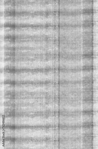 Sample black and white printout of a laser printer with a faulty toner cartridge leaking toner.