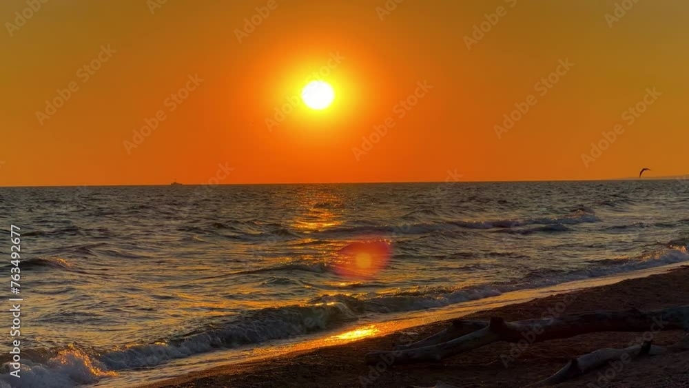 Sunset on the beach in Golubitskaya. Beautiful sunset on the background of the sea. Sunset landscape, amazing light of nature. The background of the nature environment.The Sea of Azov. Golubitskaya 4К Sunset on the beach in Golubitskaya. Beautiful sunset on the background of the sea. Sunset landscape, amazing light of nature. The background of the nature environment.The Sea of Azov. Golubitskaya 4К