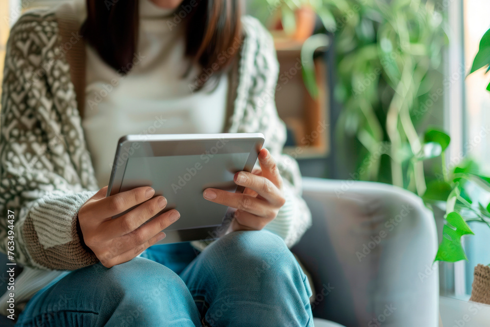 woman with tablet in hand woman with tablet in hand