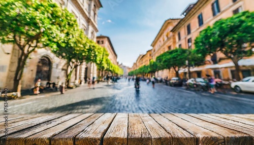 the empty wooden table top with blur background of rome street exuberant image © Diann