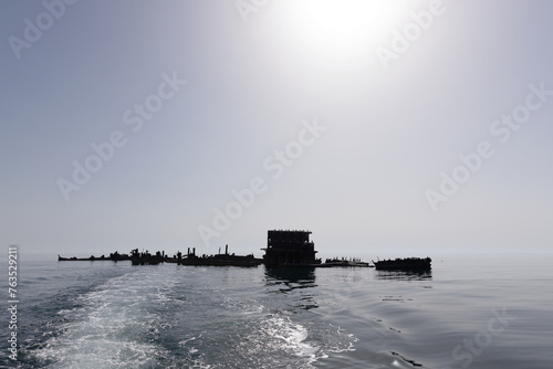 A submerged tugboat shipwreck around 8km in the eastern coast of Bahrain sea.