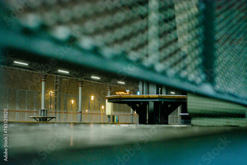 Railway station at night during snowfall
