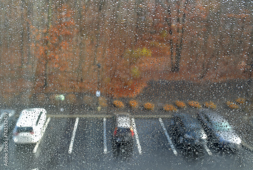 Autumn rain on window glass