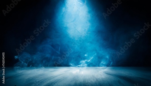 empty dark blue abstract cement wall and studio room with smoke float up the interior texture for display products wall background