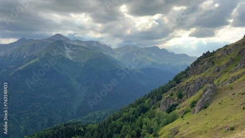 View of the mountain range near Mount Zakan. The top of the mountain node of the western part of the main ridge of the Greater Caucasus. Zakan Peak is the beginning of the Magisho mountain range. 4К photo