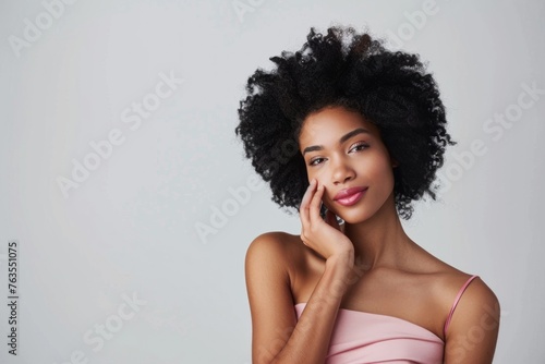 A beautiful black woman with an afro hairstyle