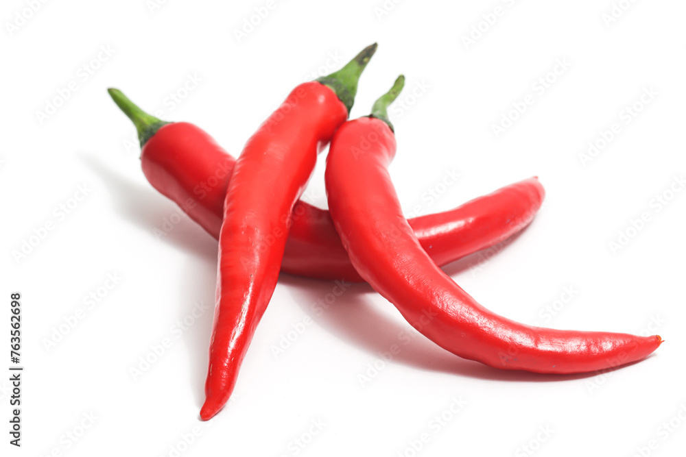 Three red hot chili pepper isolated on white background clipping path