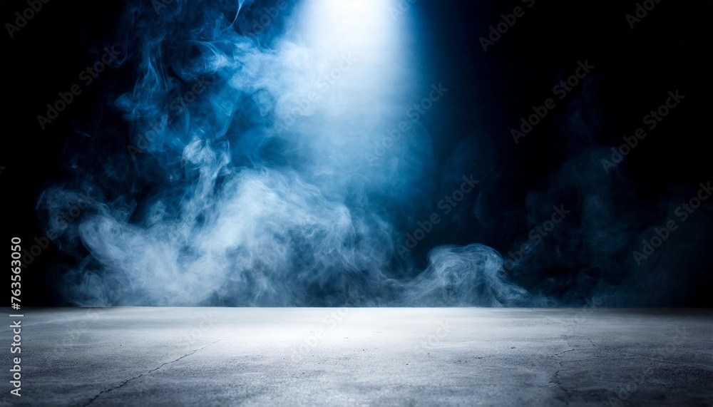 empty space studio dark room of concrete floor with spot lighting and smoke in black background