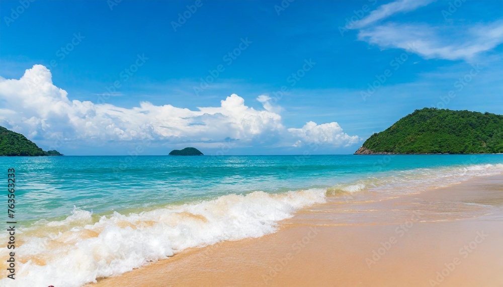 beach wave water in the tropical summer beach with sandy beach background