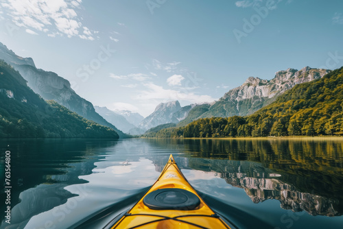 Serene Kayaking in Mountainous Landscape © spyrakot