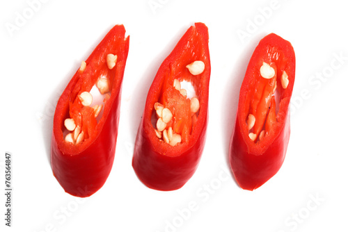 Three sliced red hot chili pepper top view isolated on white background clipping path