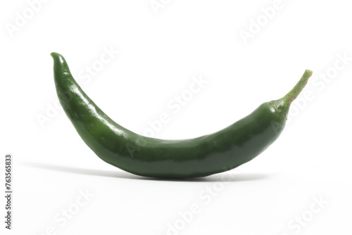 Green hot chili pepper side view isolated on white background clipping path