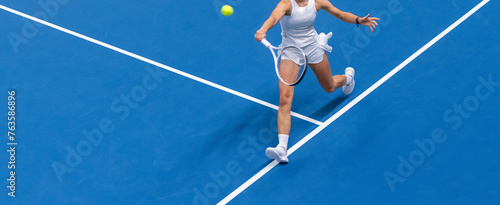 Woman playing tennis on blue floor. Horizontal sport poster, greeting cards, headers, website