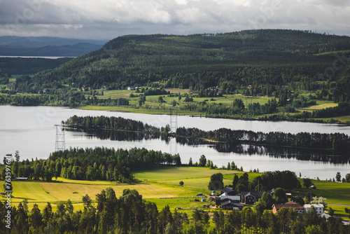 Green fields in front of the river Ljusnan in Hälsingland