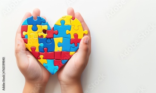Wallpaper Mural Child hands holding heart shaped colorful puzzle Torontodigital.ca