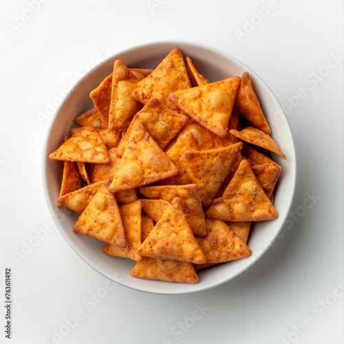 Bowl of tortilla chips from directly above on white background