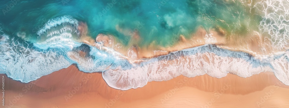 aerial photo of beautiful summer sandy beach and blue ocean with copy space, top view from drone. Summer seascape beautiful waves. blue sea water in sunny day. Sea aerial view. 
