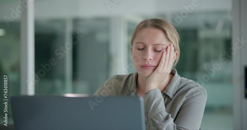 Business, tired and woman with laptop, fatigue and exhausted with burnout and overworked in a modern office. Person, PR consultant and employee with computer and sleepy with stress and mental health photo