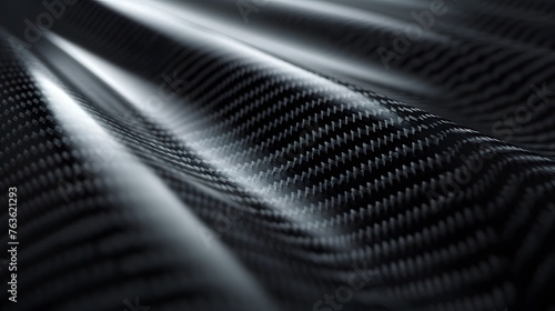 carbon kevlar fiber texture pattern background, detailed pattern of a kevlar fibre sheet in a full frame view photo