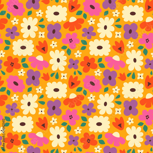 Vector seamless pattern of bold naive colourful flowers and leaves in retro groovy style. Daisy flowers in vivid colours on orange background. © fireflamenco