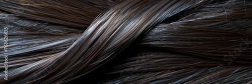 Dark hair background showcasing healthy  shiny texture ideal for beauty and design concepts