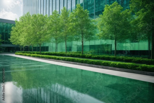 Glass business office building with trees in environmentally friendly city