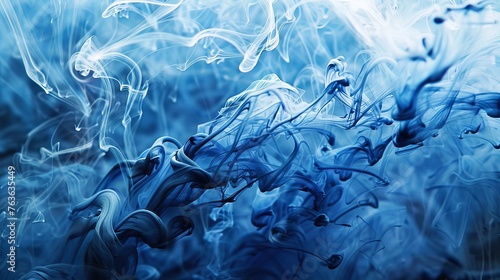 Blue ink liquid in water making abstract forms