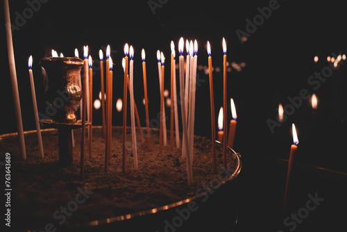 Greek Orthodox Christian Easter ceremony procession, divine worship service, worshippers hold candles, parishioners during an Easter vigil mass in a Cathedral, Athens, Attica, Greece, divine liturgy photo