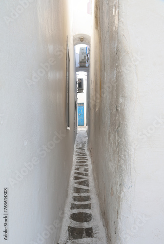 Mykonos, Greece: The narrowest of alleyways between two streets in the old town.