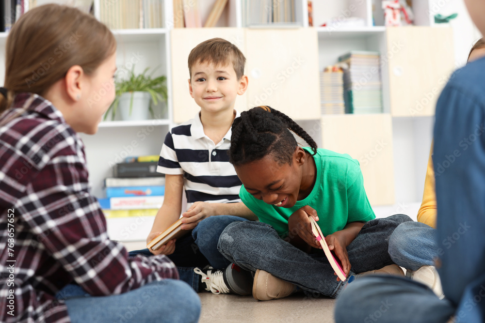 Cute children having fun in classroom at school Cute children having fun in classroom at school