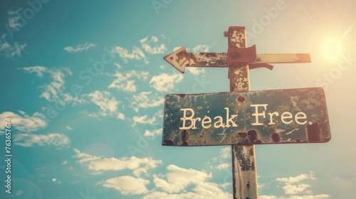 Break free  word and arrow signpost on clear sky background. Motivational sign. Vintage style. photo