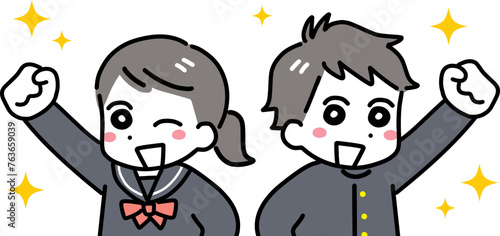 笑顔でガッツポーズをしている中学生の男女