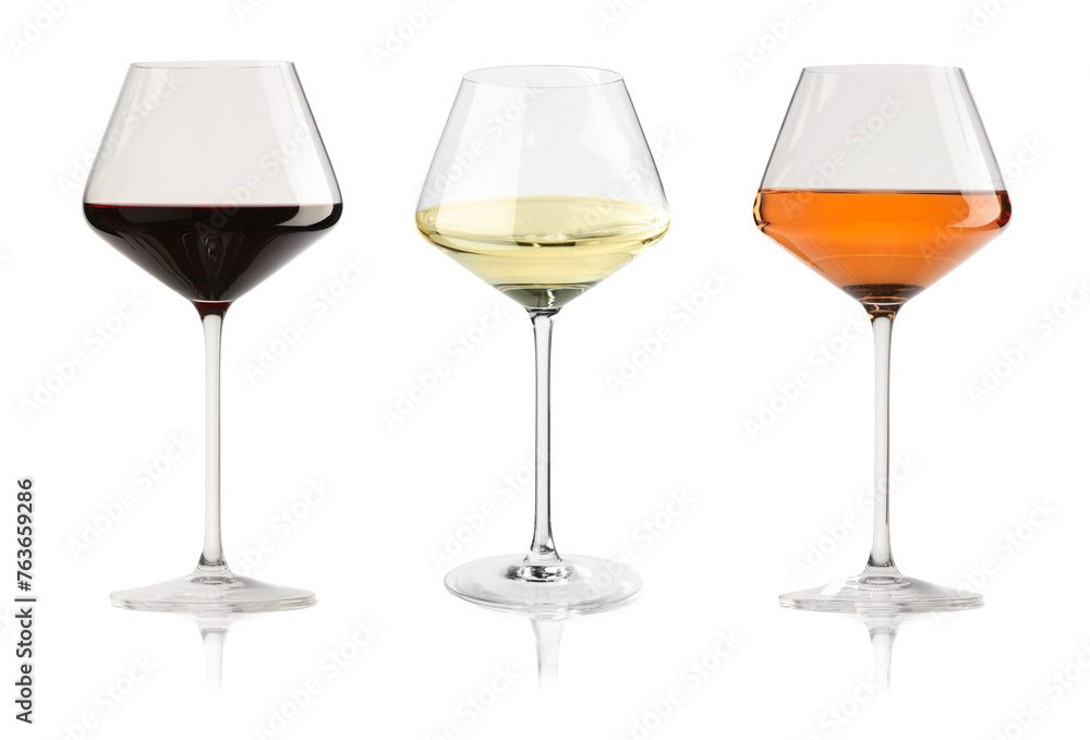 Tasty white, rose and red wines in glasses isolated on white Tasty white, rose and red wines in glasses isolated on white