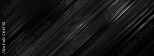 Contemporary carbon fiber surface with a sharp diagonal stripe pattern, offering a backdrop of elegance and power.