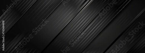 Contemporary carbon fiber surface with a sharp diagonal stripe pattern, offering a backdrop of elegance and power.