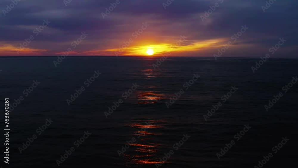Glowing sun just above horizon before setting over Pacific Ocean off Oregon Coast. Glowing sun just above horizon before setting over Pacific Ocean off Oregon Coast.