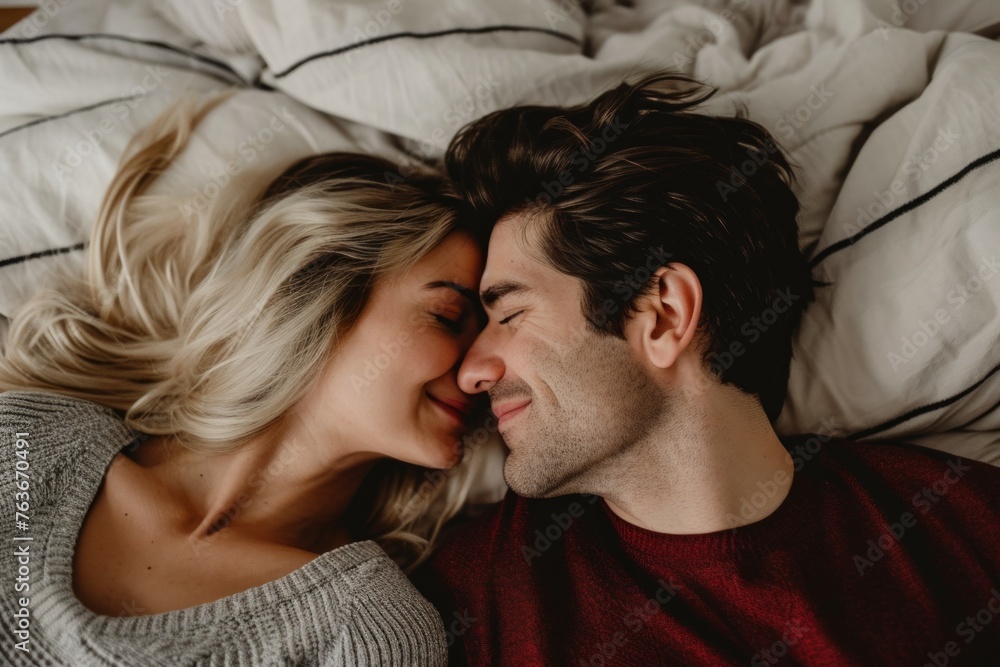 Couple in bed, concept of enjoying the morning. Backdrop with selective focus and copy space Couple in bed, concept of enjoying the morning. Backdrop with selective focus and copy space
