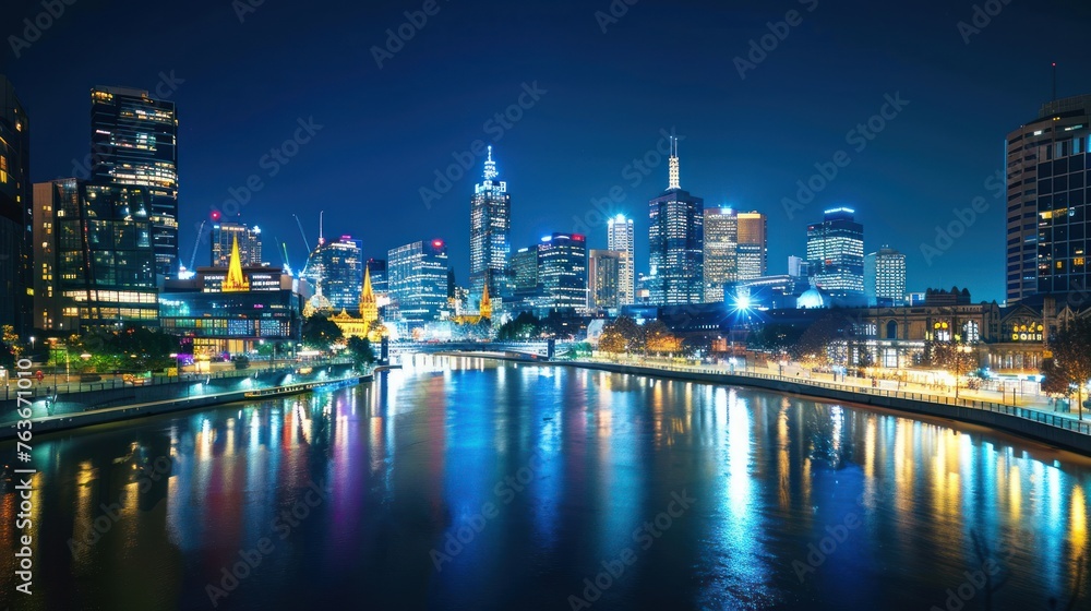 A panoramic view of a bustling city skyline at night, illuminated by thousands of lights. 