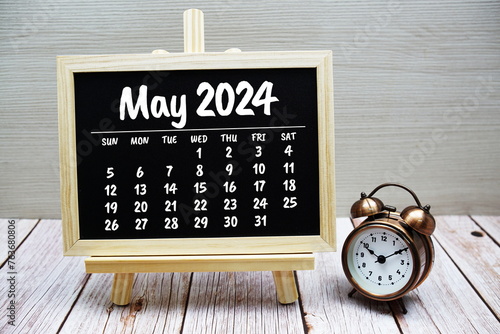 May 2024 monthly calendar on chalkboard for planning and management
