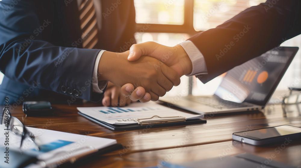 businessman hand shaking over a contract file on the table in office, successful business deal concept, corporate people hand shake businessman hand shaking over a contract file on the table in office, successful business deal concept, corporate people hand shake