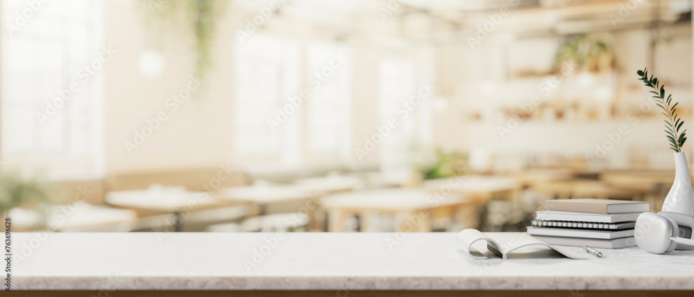 A white table featuring a presentation space for displaying products in a contemporary coffee shop. A white table featuring a presentation space for displaying products in a contemporary coffee shop.