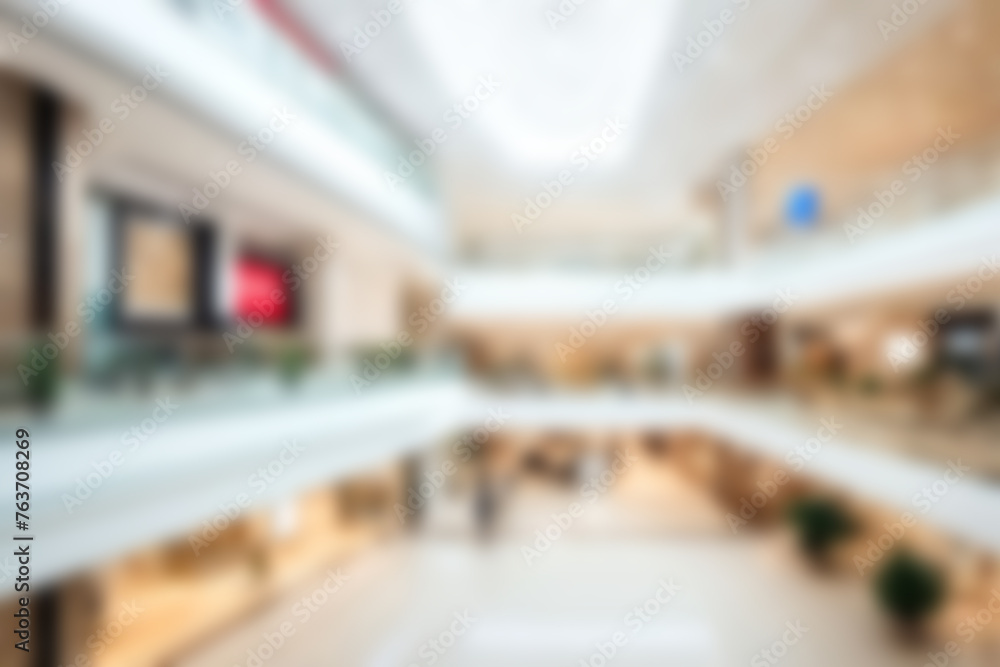 Abstract blurred image of shopping mall with light and bokeh for background usage. Blur interior background