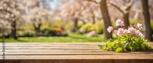 Spring background with empty wooden table. Spring product display banner.