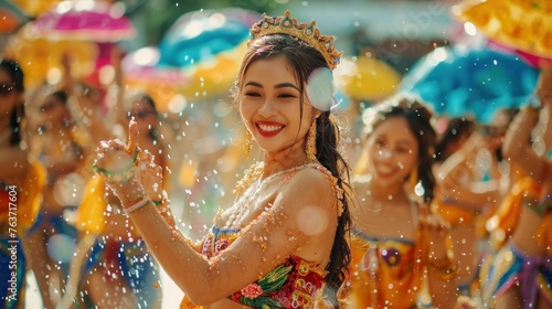 Thai women in summer clothes dance happily over enjoying in songkran festival