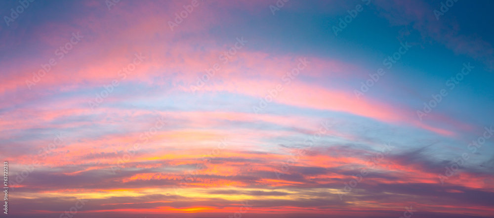 Gentle ligth colors of sunrise sundown sky with pastel  light  clouds, hi resolutions cloudscape panorama. Real