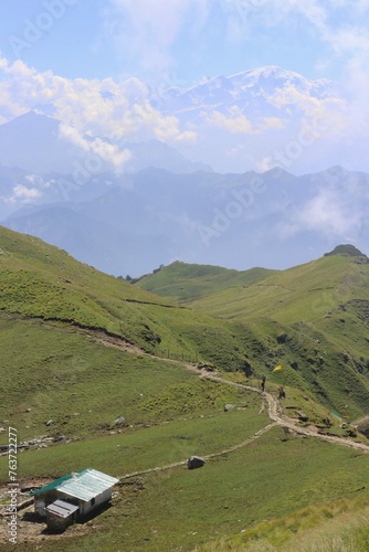 a landscape view showing panar meadow and himalaya peaks on the trek of rudranath, uttarakhand india © deepak