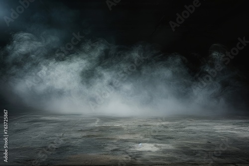 Mysterious and cold concrete surface shrouded in fog, perfect for dark and atmospheric visual projects.