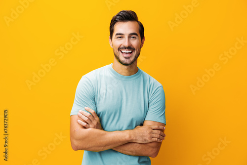 Space man portrait yellow lifestyle background laughing gesture trendy style smiling fashion copy studio arm