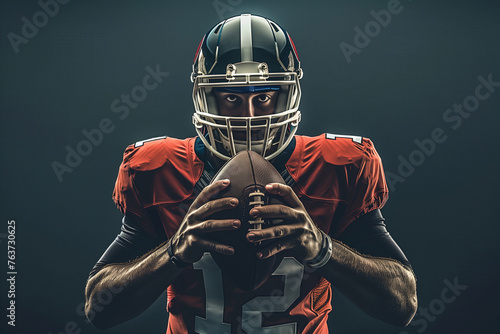 A football player is holding a football in his hands.