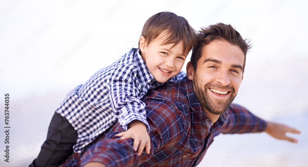 Nature, portrait and father with child flying on shoulders, smile and travel on outdoor adventure. Support, face of dad and son in nature for fun, bonding and happy trust on ocean holiday together Nature, portrait and father with child flying on shoulders, smile and travel on outdoor adventure. Support, face of dad and son in nature for fun, bonding and happy trust on ocean holiday together